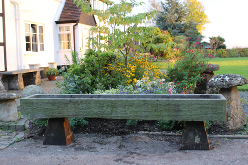 Long planting stone trough