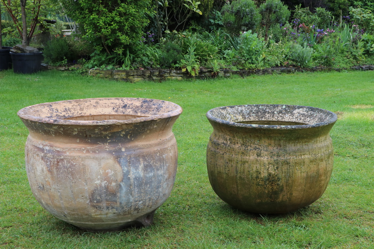 Two antique stone wash pots